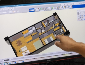 リフォームプランを提案する女性社員